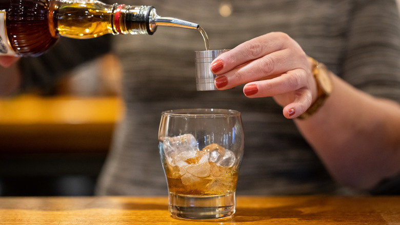 whiskey pour at a bar