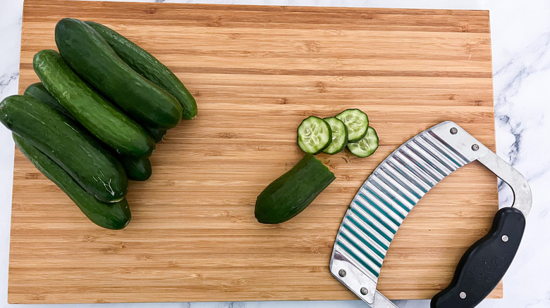 cucumbers on cutting board 