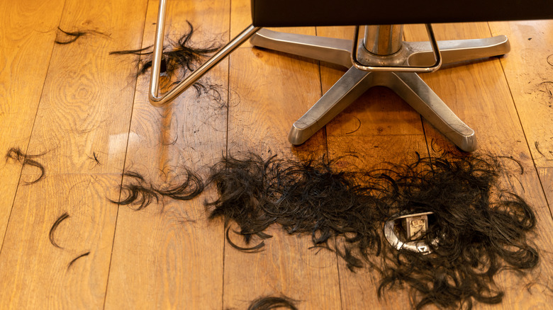 Cut hair on the floor at a salon