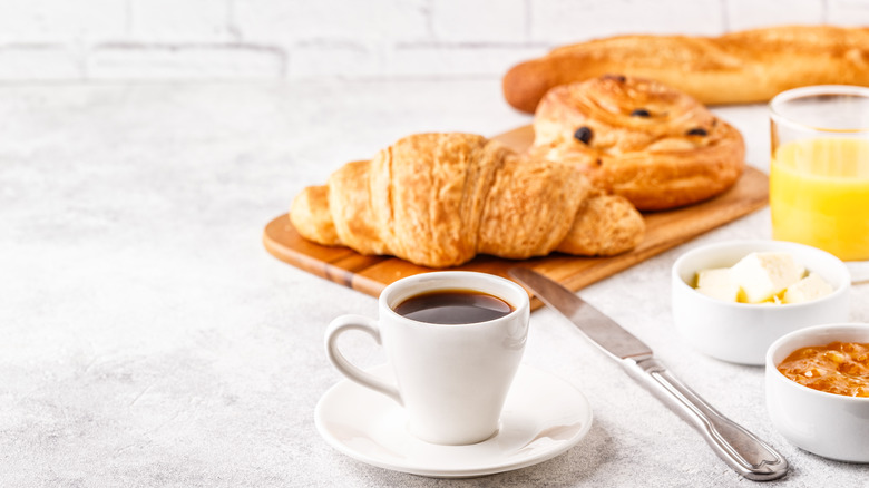 breakfast of coffee and croissants