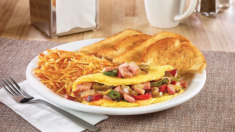 denny's omelet on plate