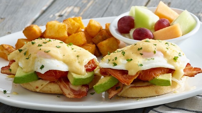 avocado eggs benedict with fruit