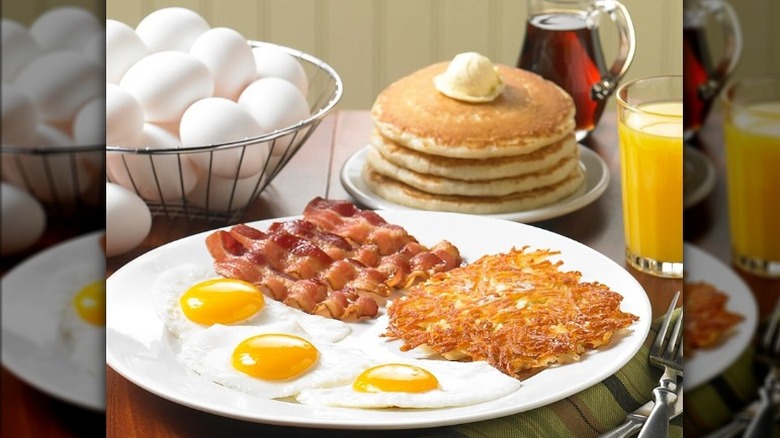 breakfast plate with stack of pancakes