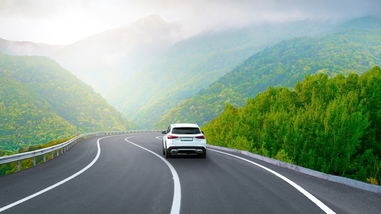 Car driving down a road