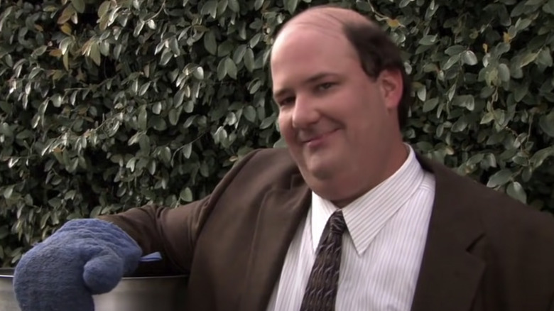 Kevin Malone from The Office carrying chili 