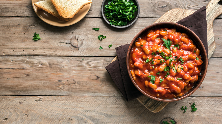 Chili on wooden paddle and table