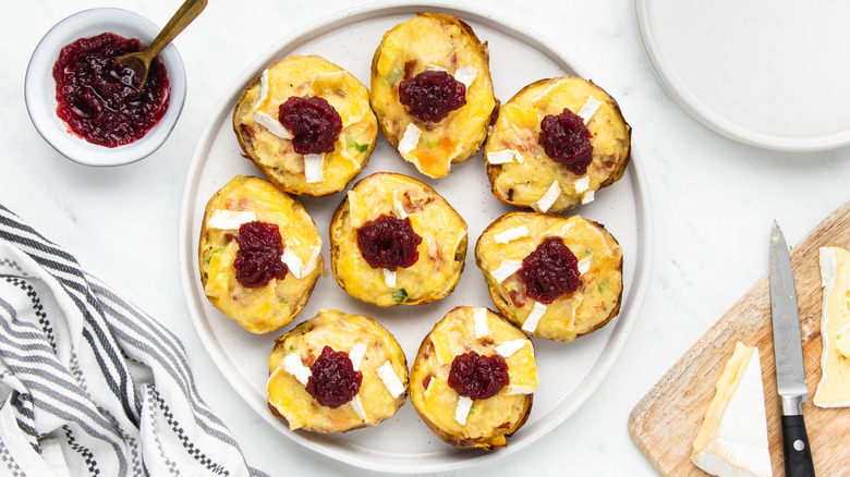 Brie and bacon potato skins on plate