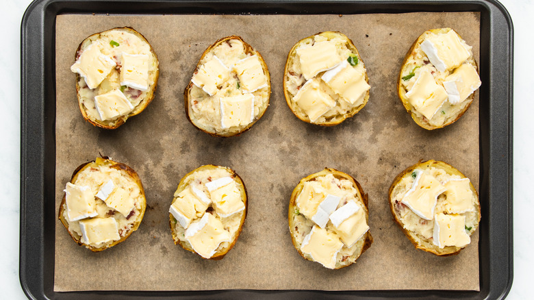 Brie potato skins on baking sheet