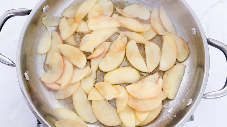 sliced apples in pan