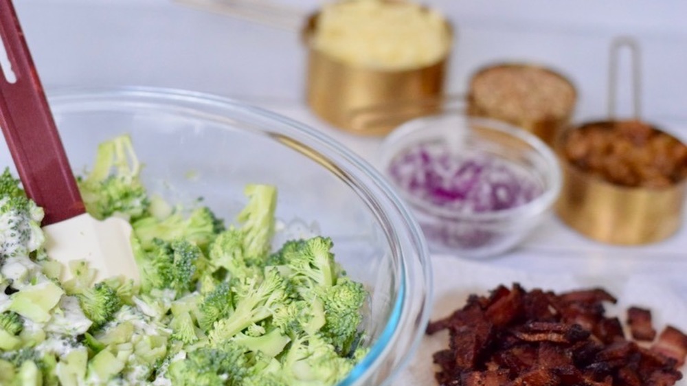 broccoli with dressing, add-ons on side with bacon