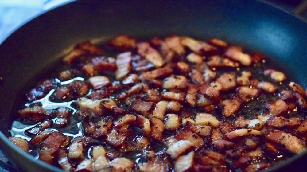 bacon cooking in pan