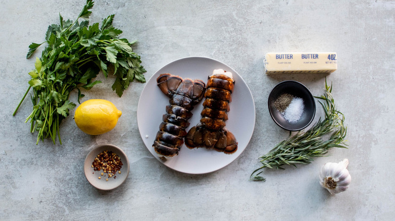 uncooked lobster tails with seasonings