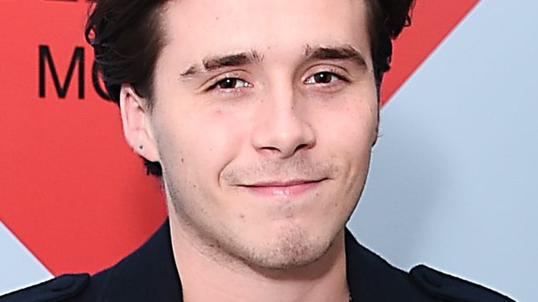 Brooklyn Beckham smiling