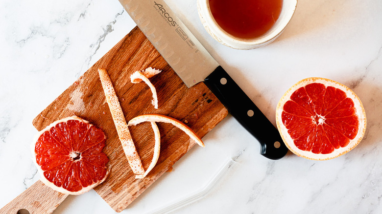 grapefruit slices on cutting board