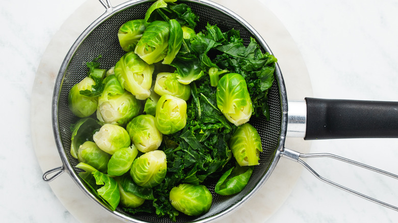 brussels and kale in strainer