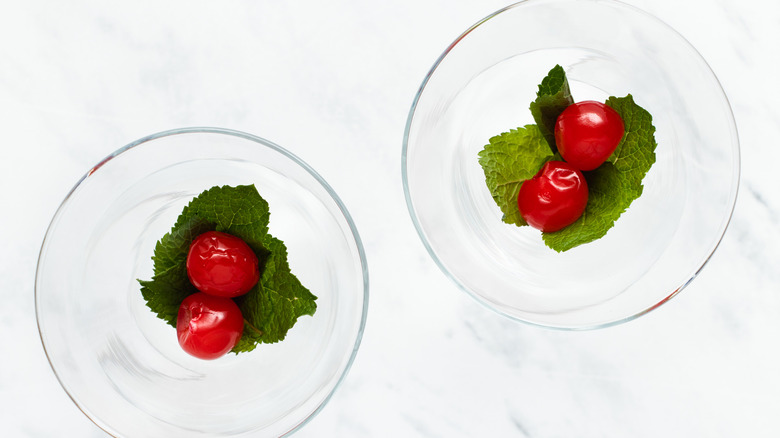 cherries and mint in glasses