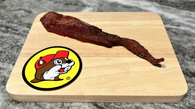 Buc-ee's Hill Country Brand Peppered Turkey Jerky strip on board