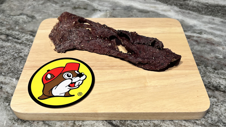 Buc-ee's Old Western Style Peppered Beef Jerky strip on board