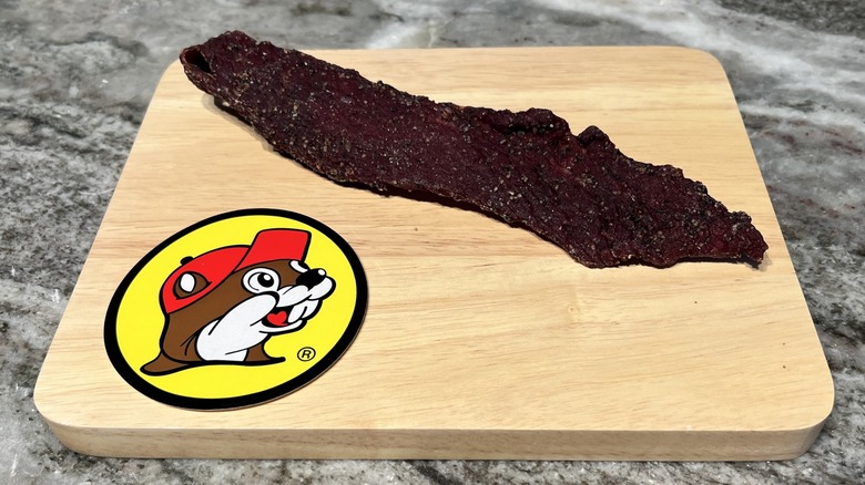 Buc-ee's Hill Country Brand Peppered Beef Jerky strip on board