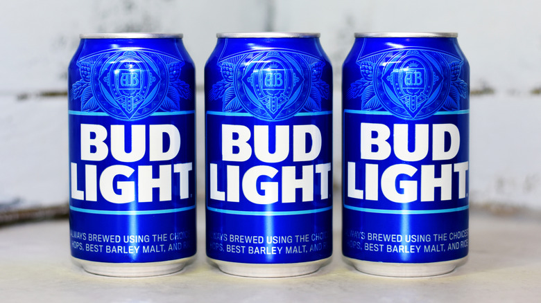 Three cans of Bud Light beer