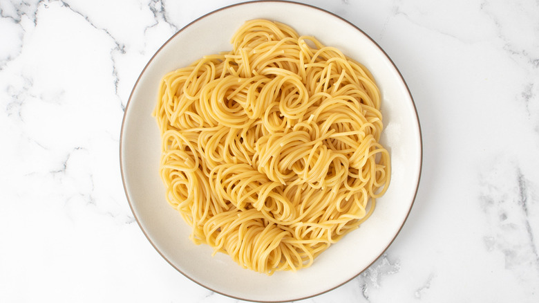 spaghetti on white plate