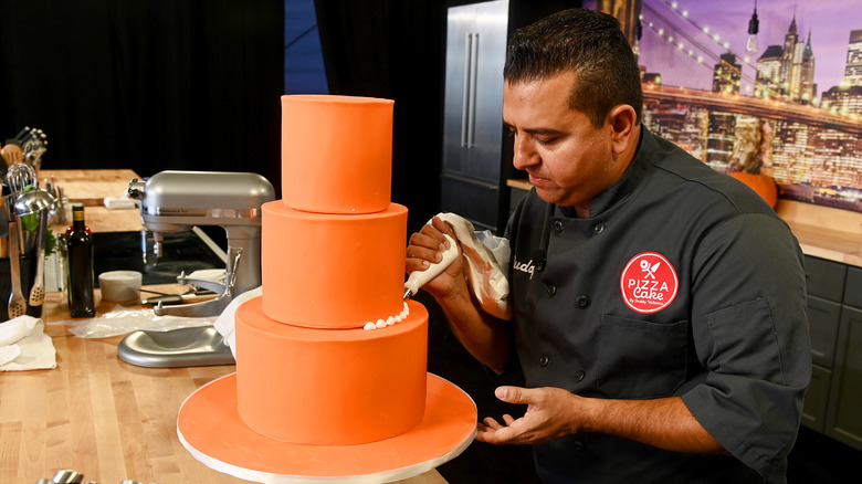 Buddy Valastro working on a cake