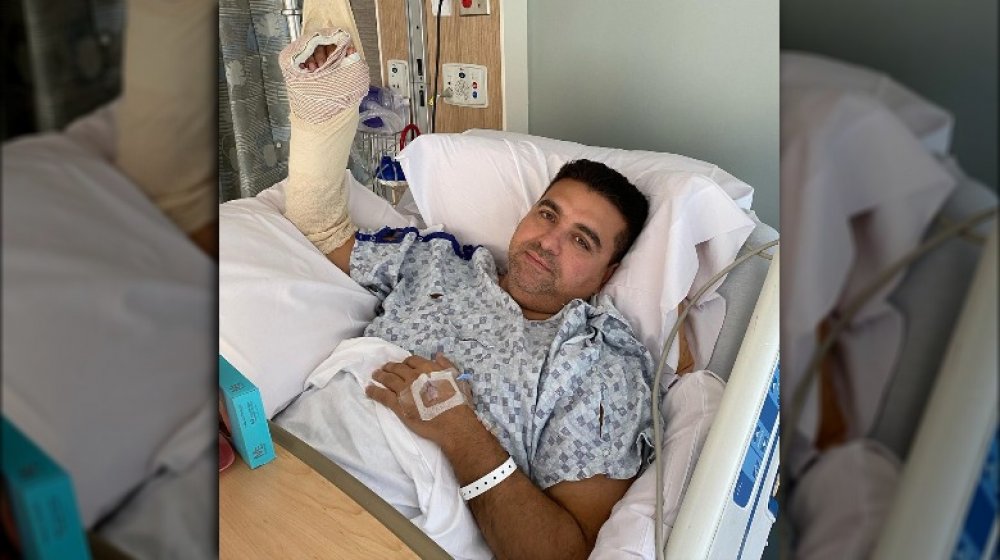 Buddy Valastro laying in a hospital bed after an accident