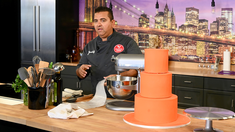 Buddy Valastro making a cake