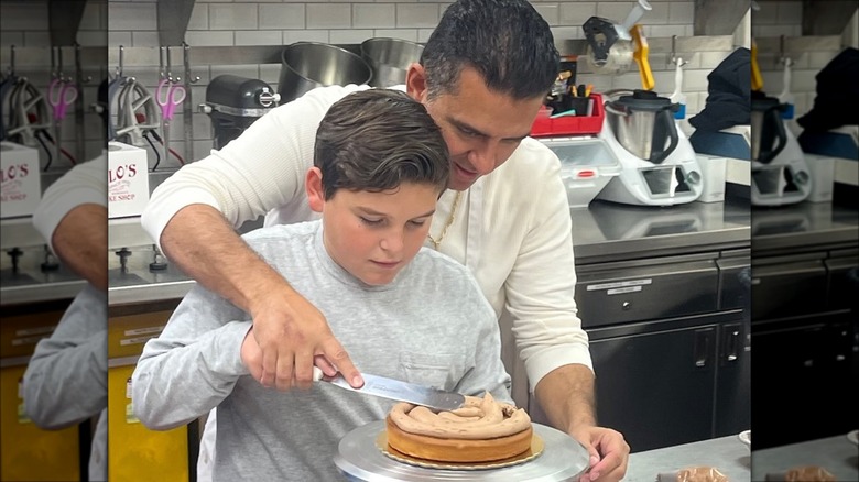 Carlo Valastro making cake with dad