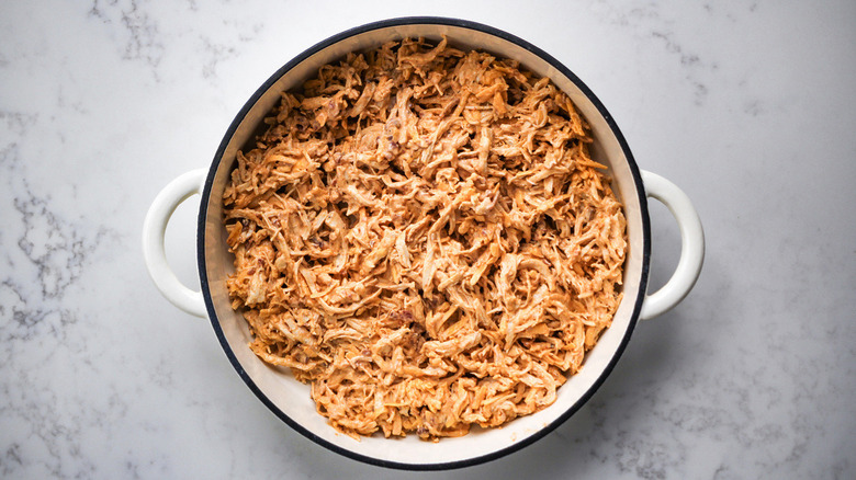 shredded chicken in pan