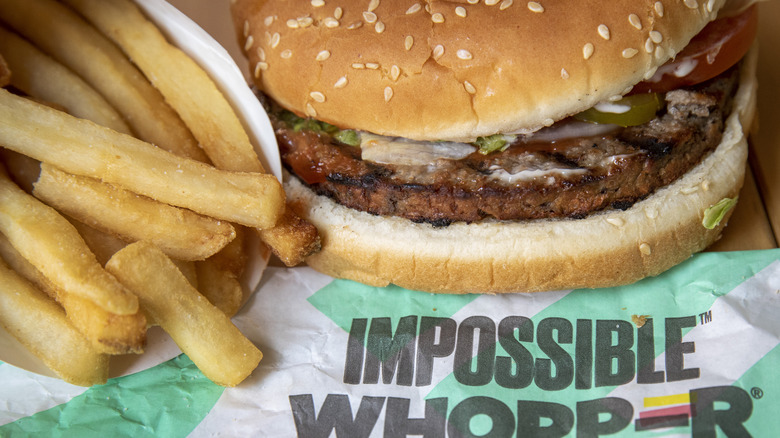 The impossible Whopper with fries on a tray