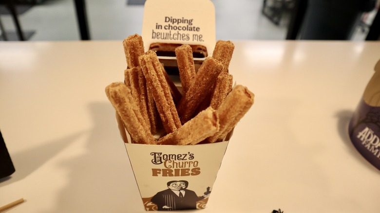 churro fries in box with chocolate sauce