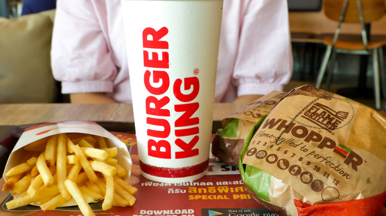 Burger King cup, burger, and fries