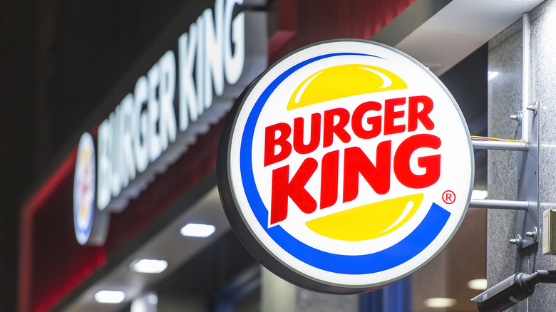 A close-up of a Burger King sign