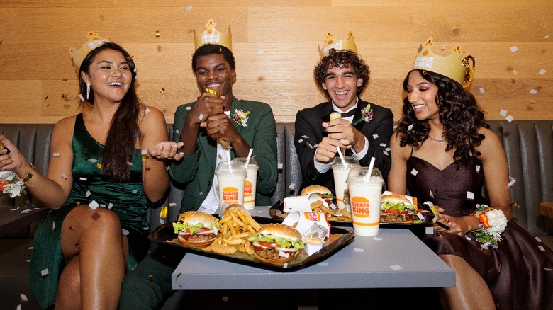young people eating Burger King