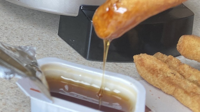 Syrup dripping from chicken fry