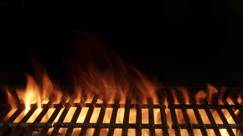 flaming barbecue in the dark