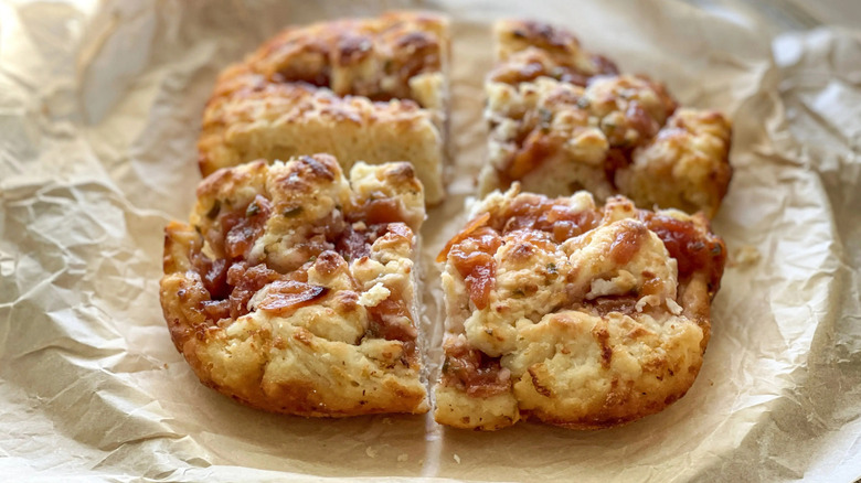 4 biscuits on parchment paper