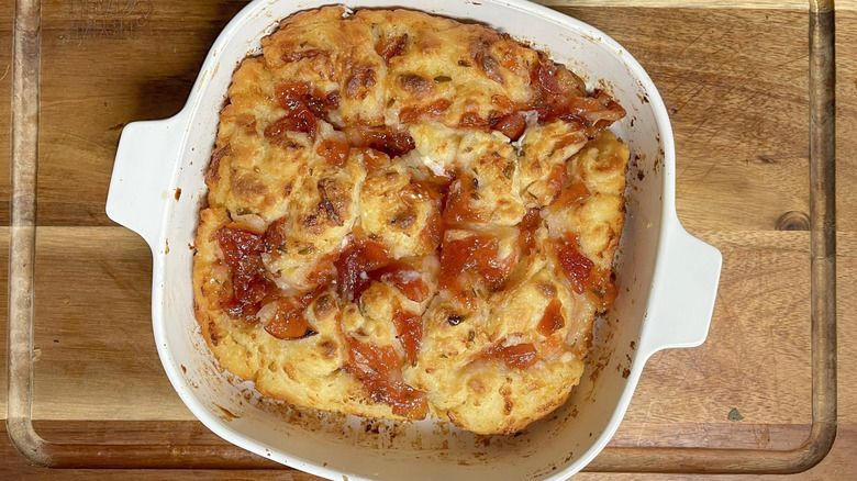 Biscuits with jam in baking dish