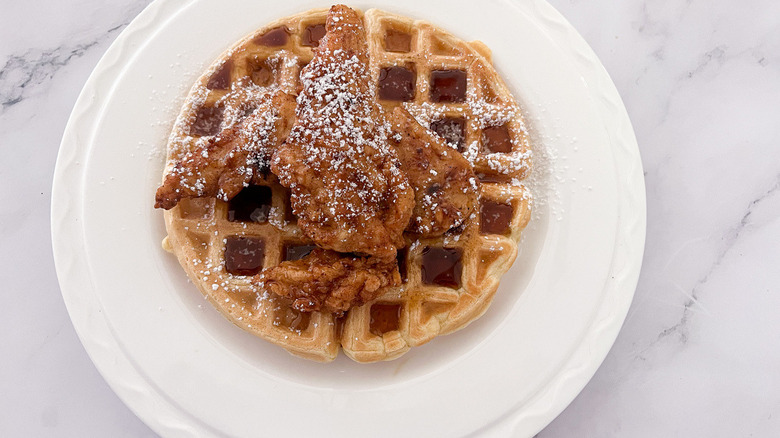 waffle with chicken on plate