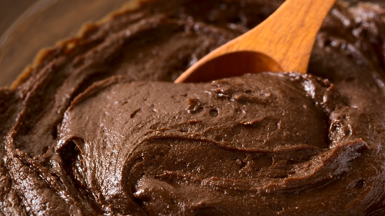 brownie batter mixed with spoon