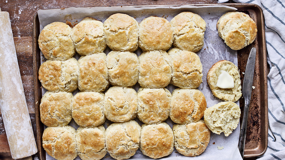 Biscuits on a baking sheet with butter