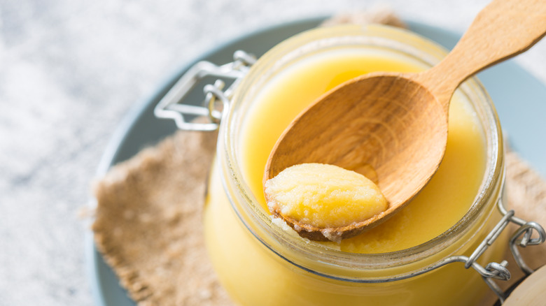 butter in jar with spoon