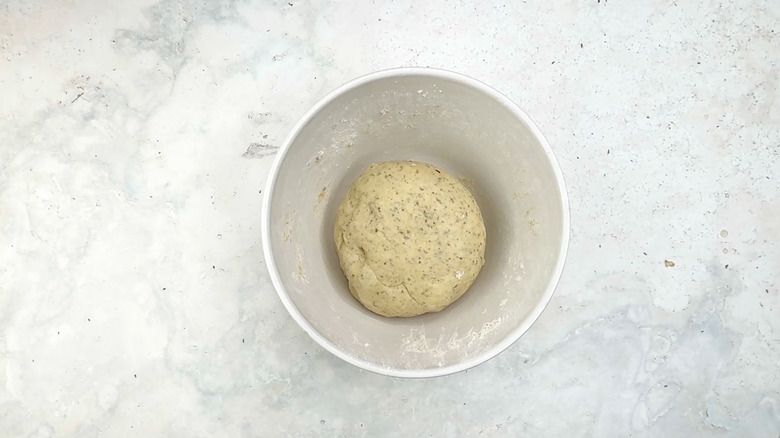 bread dough ball in mixing bowl