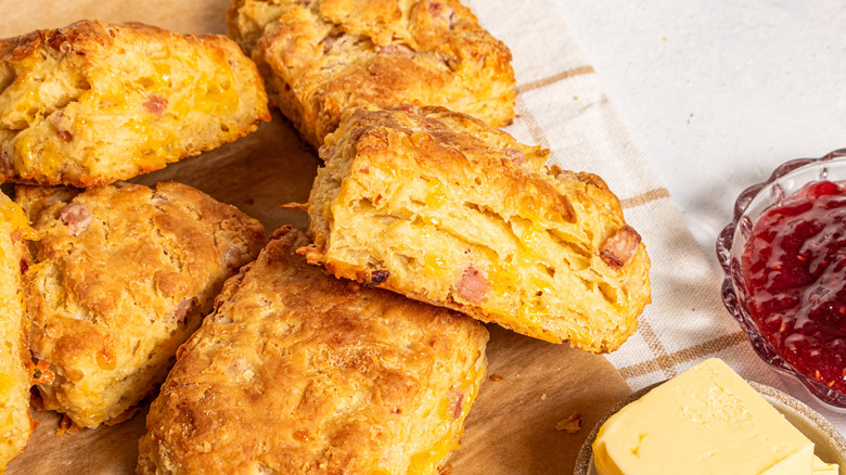 Ham and cheese biscuits with a side of jam and butter