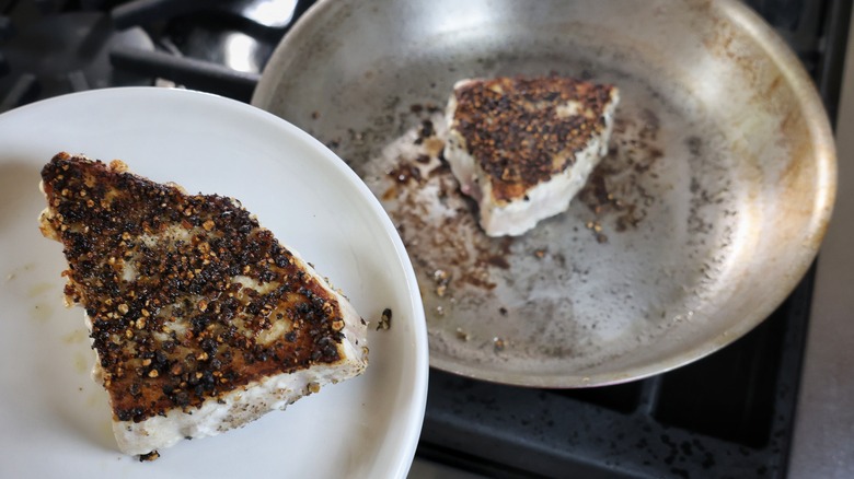 removing swordfish from skillet