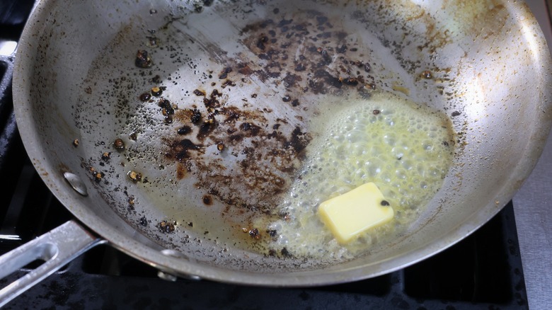 butter melting in skillet