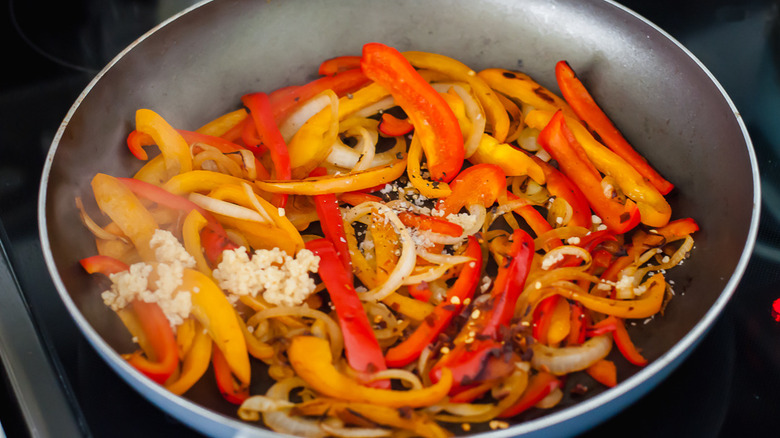 sautéed peppers and onion with minced garlic and red pepper flakes