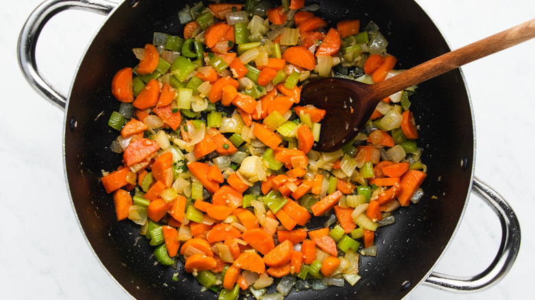 chopped veggies sauteing in pot