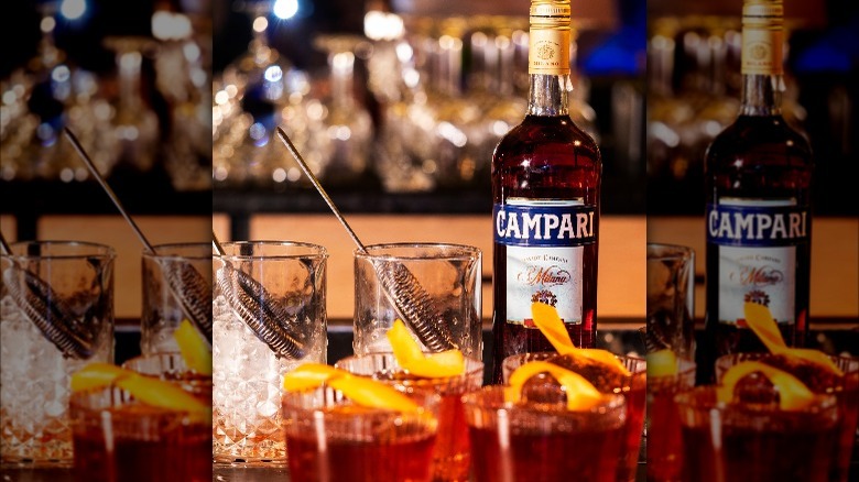 Campari bottle with cocktails 